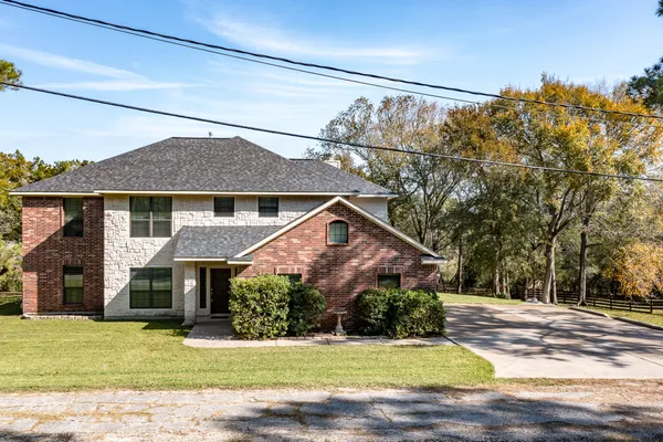a front view of house with yard