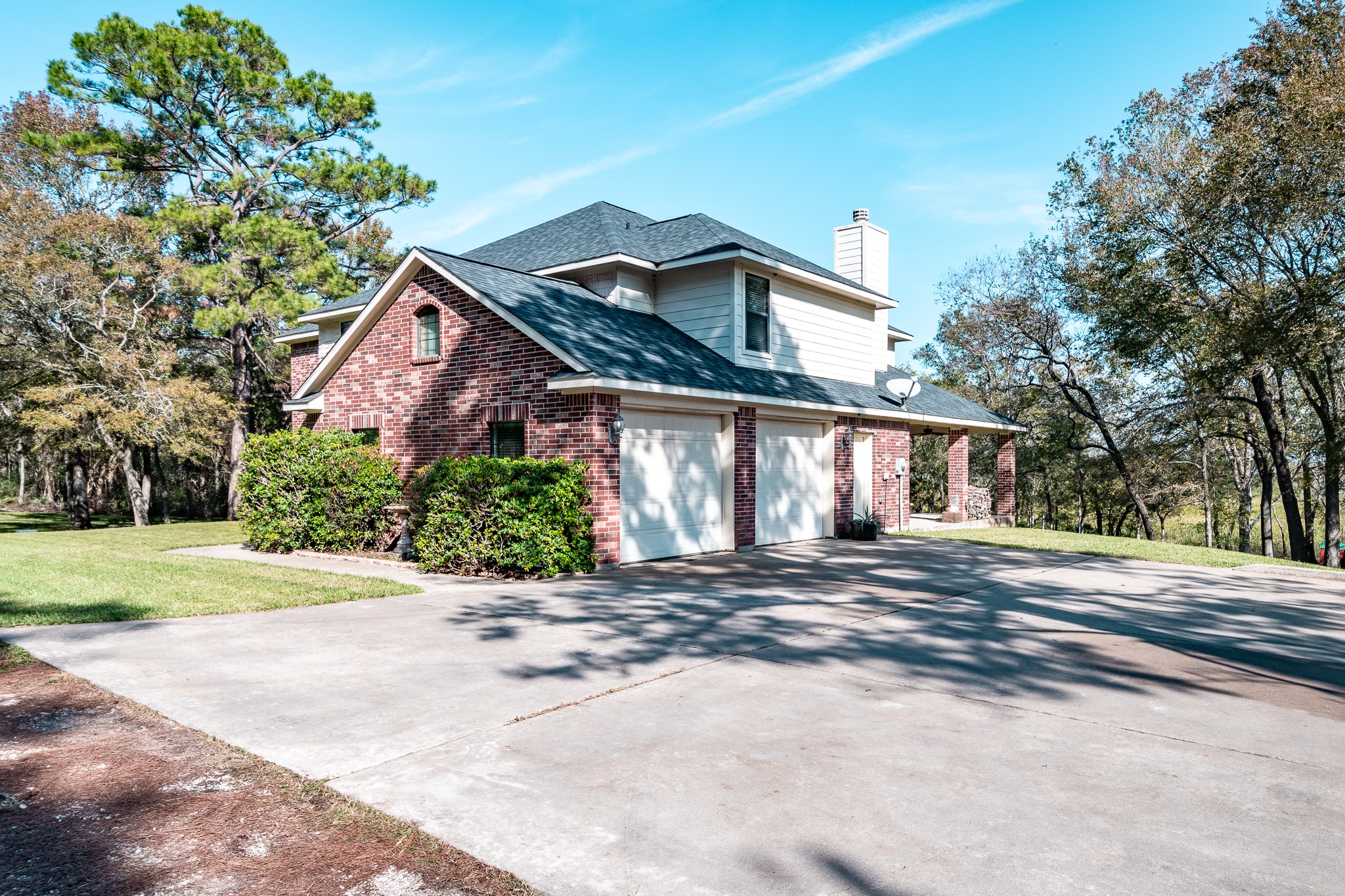507 Oaks Grande Road Baytown, TX 77523 - Photo 36 of 50 a front view of a house with a yard and a garage