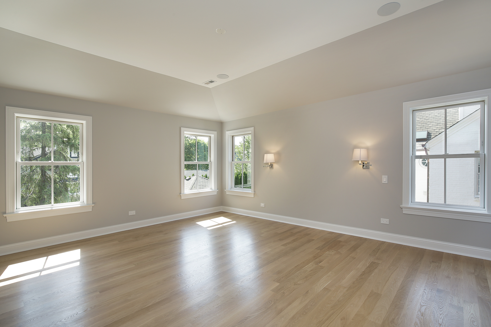 517 Cumnor Road Kenilworth, IL 60043 - Photo 11 of 24 an empty room with wooden floor and windows