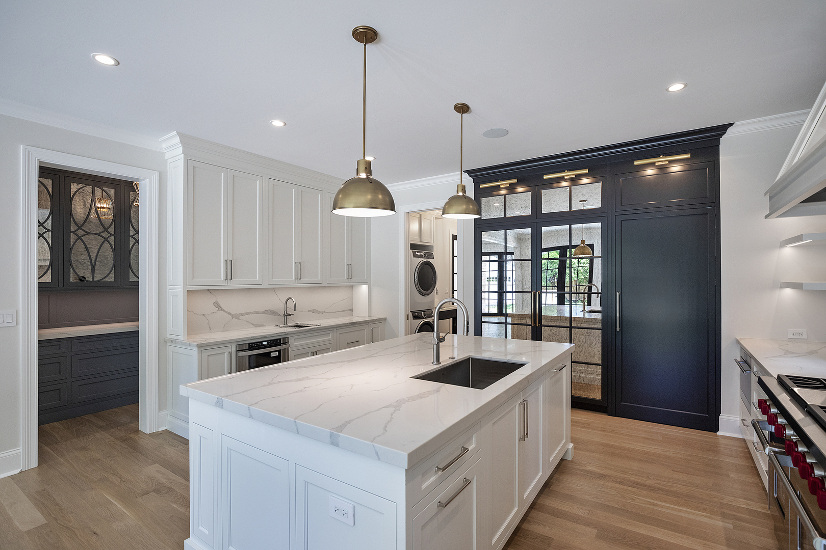 517 Cumnor Road Kenilworth, IL 60043 - Photo 3 of 24 a kitchen with counter top space and stainless steel appliances