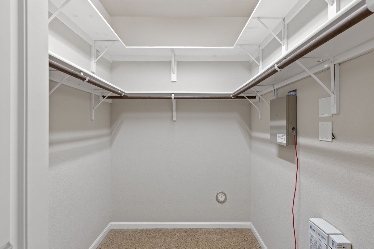 407 Stone View Trail Austin, TX 78737 - Photo 27 of 40 a view of an empty walk in closet