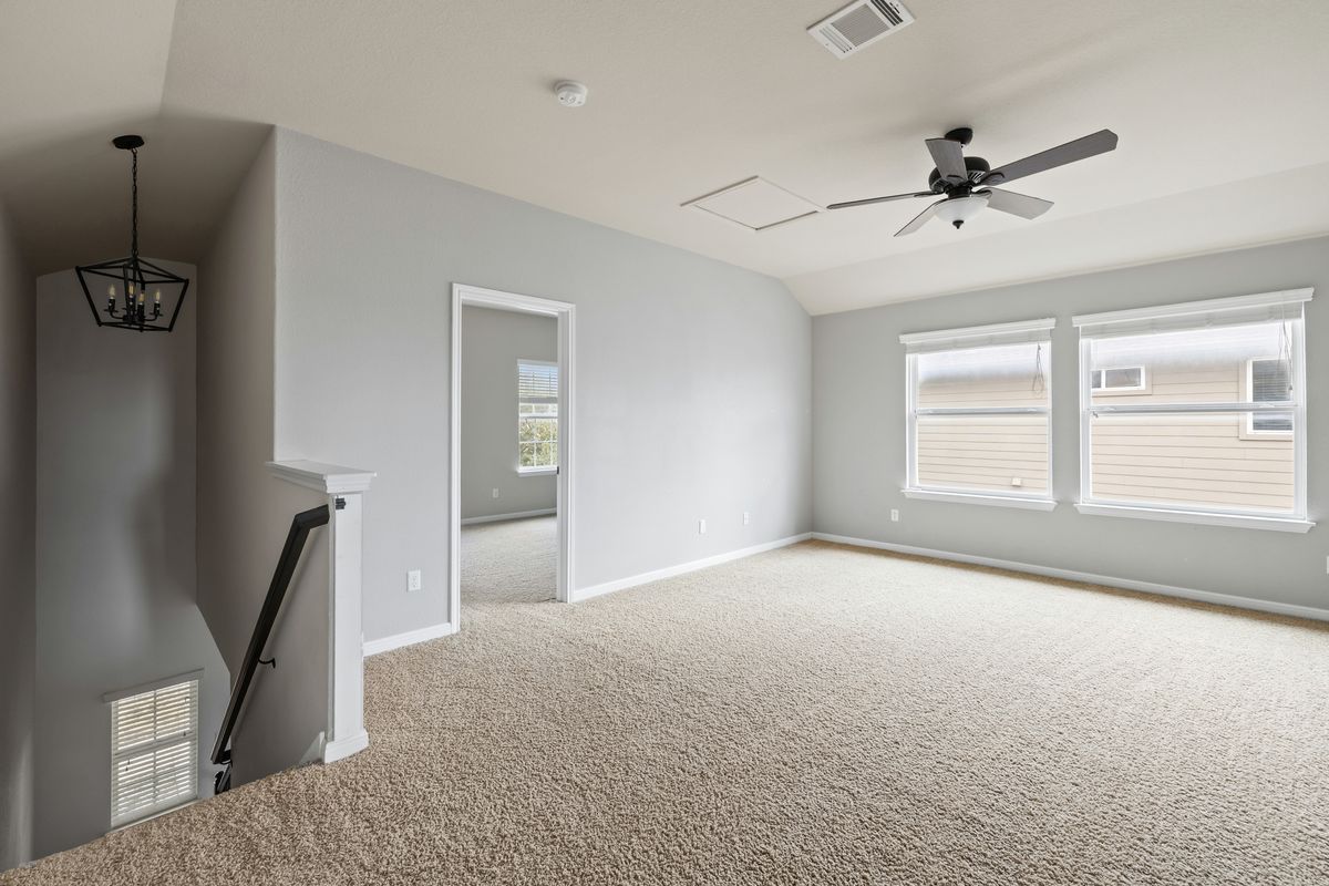 407 Stone View Trail Austin, TX 78737 - Photo 28 of 40 a view of an empty room with a window