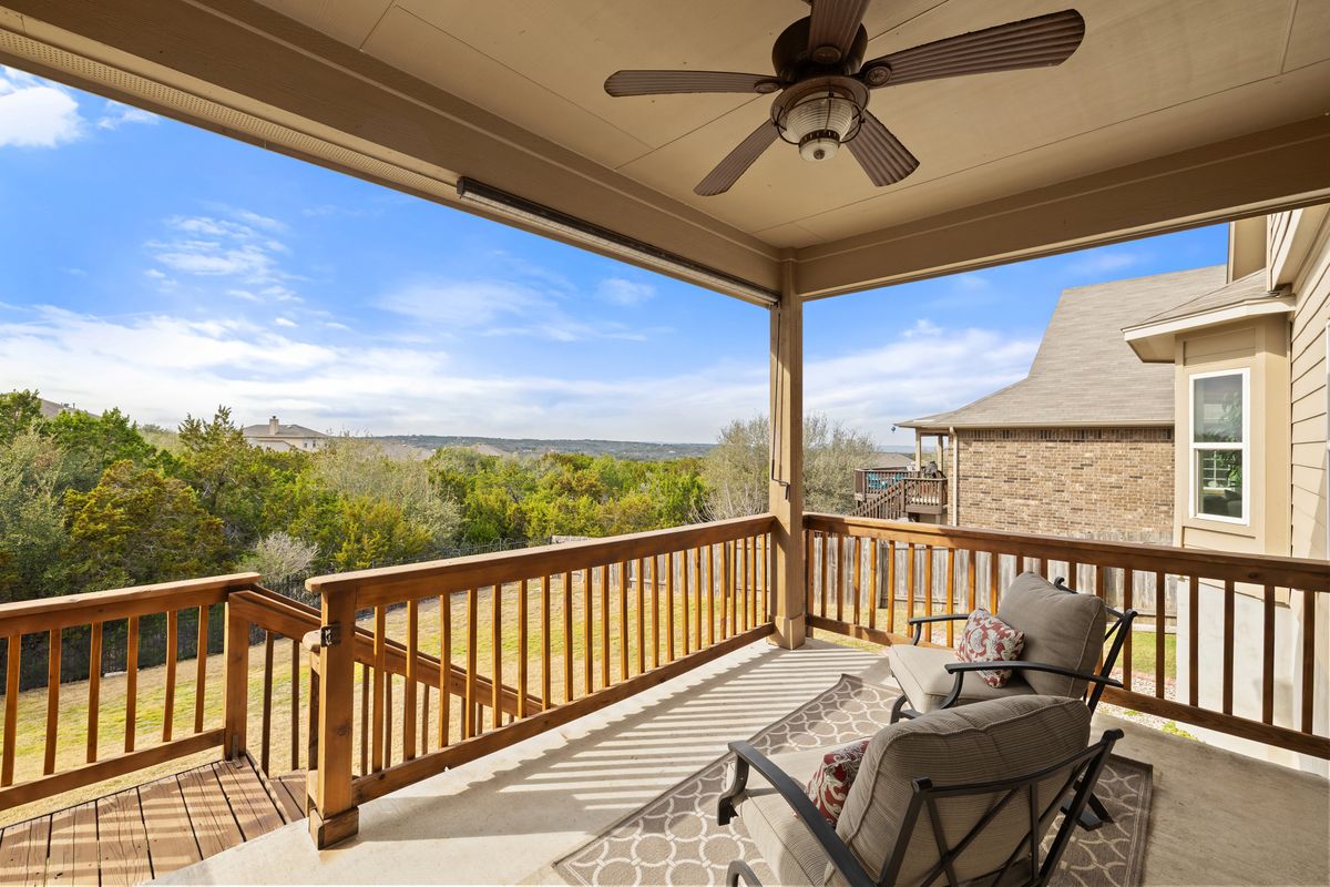 407 Stone View Trail Austin, TX 78737 - Photo 35 of 40 a view of a balcony with furniture