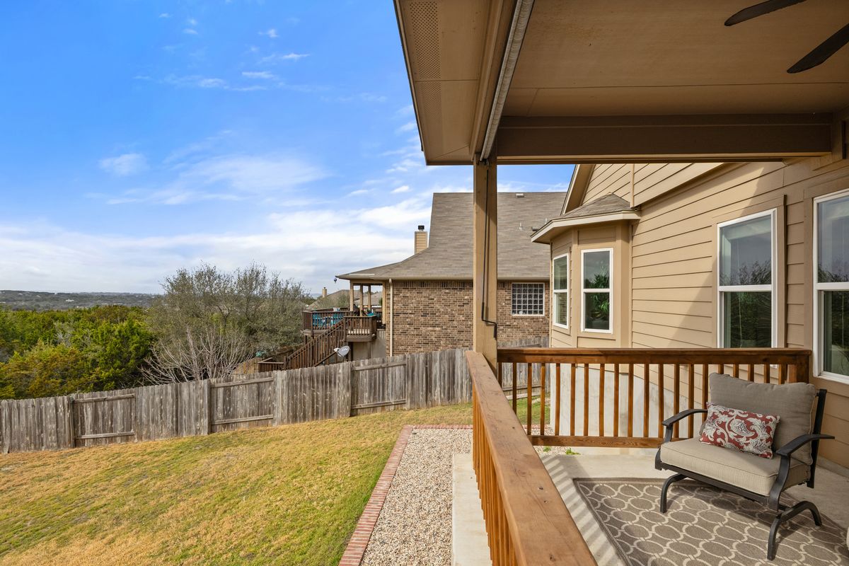 407 Stone View Trail Austin, TX 78737 - Photo 36 of 40 a view of a balcony with furniture