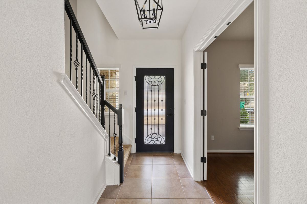 407 Stone View Trail Austin, TX 78737 - Photo 5 of 40 a view of an entryway door