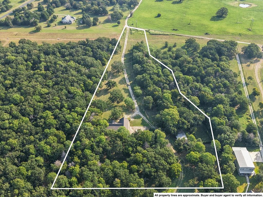 7410 County Road Kerens, TX 75144 - Photo 2 of 35 an aerial view of houses with yard