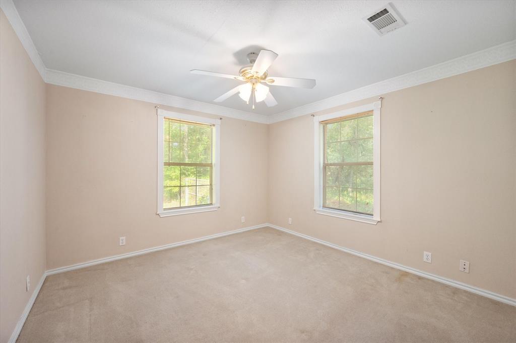 7410 County Road Kerens, TX 75144 - Photo 23 of 35 a view of an empty room with a window