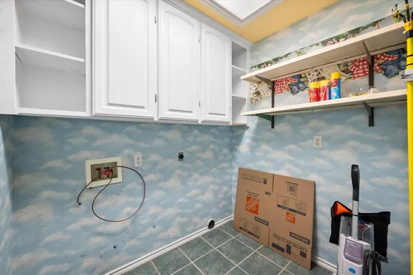 a utility room with closet