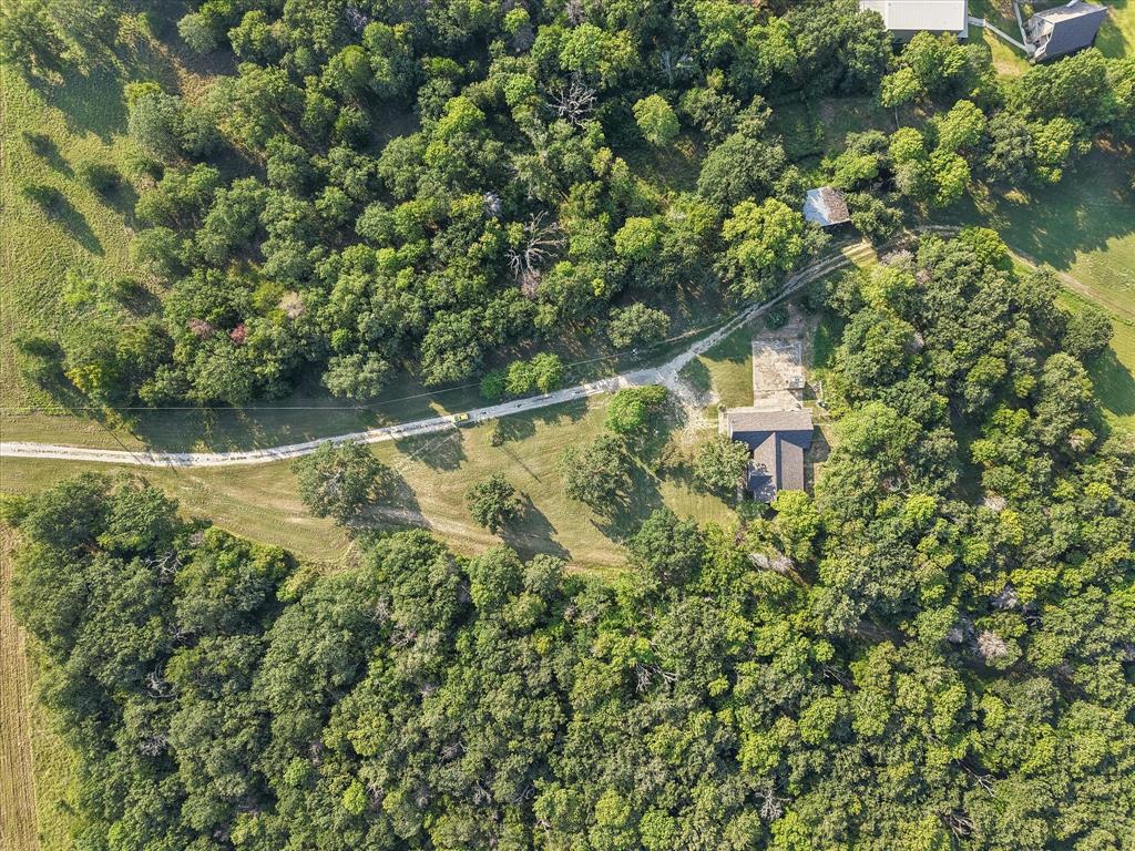 7410 County Road Kerens, TX 75144 - Photo 35 of 35 a view of a house with a yard