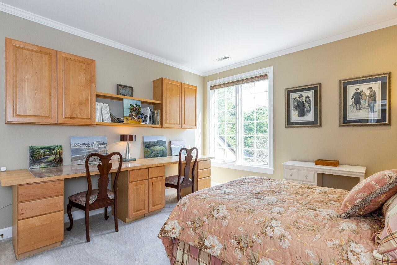 106 Cedar Ridge Way, Unit 106 Durham, NC 27705 - Photo 21 of 30 Built in cabinets and desk remain