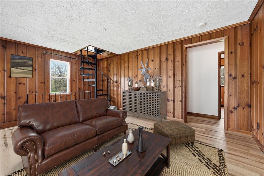 192 Yellow Creek Road Harmony, PA 16037 - Photo 13 of 41 a living room with furniture and wooden floor