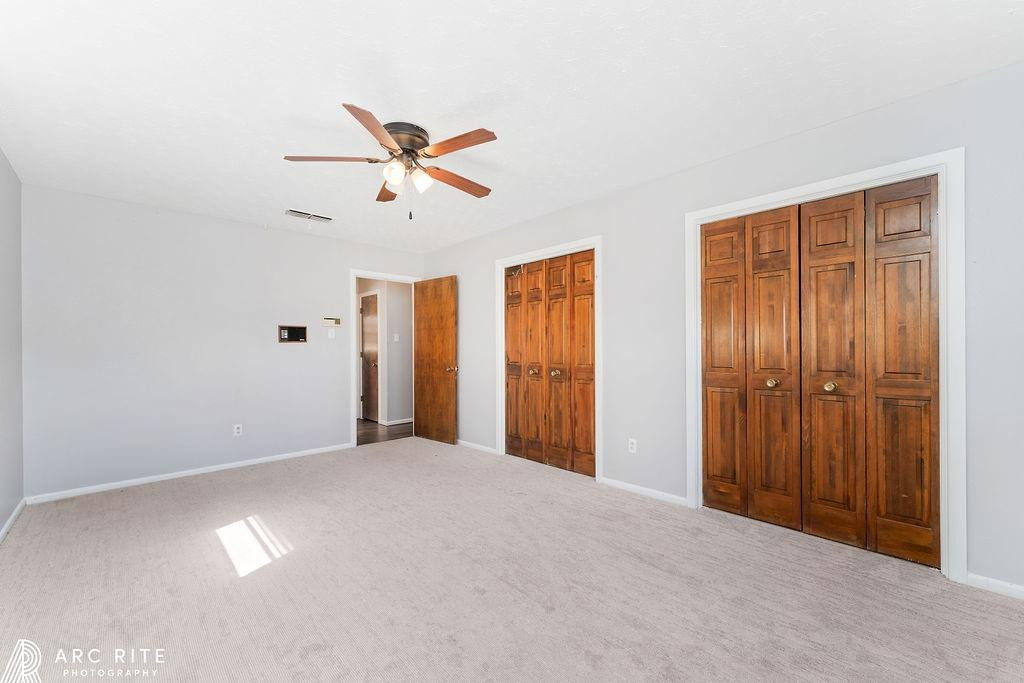 2123 North Cypress Road Lubbock, TX 79403 - Photo 11 of 22 a view of empty room with ceiling fan