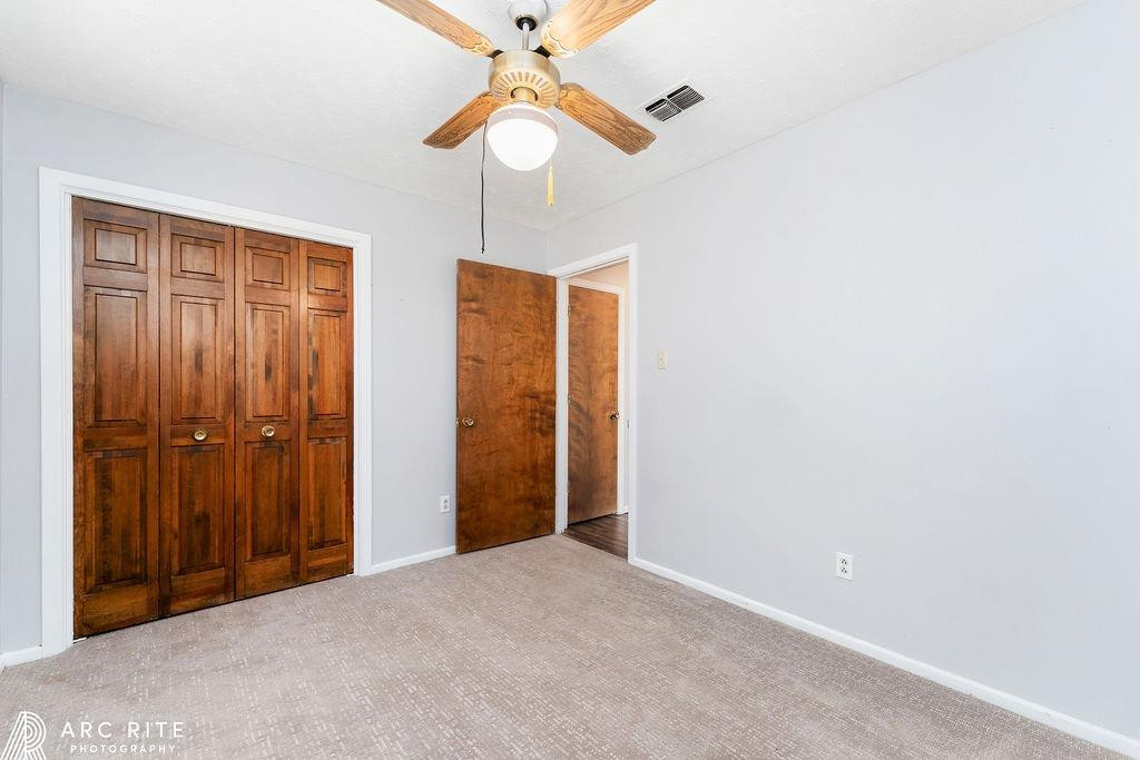2123 North Cypress Road Lubbock, TX 79403 - Photo 15 of 22 a view of room with a ceiling fan