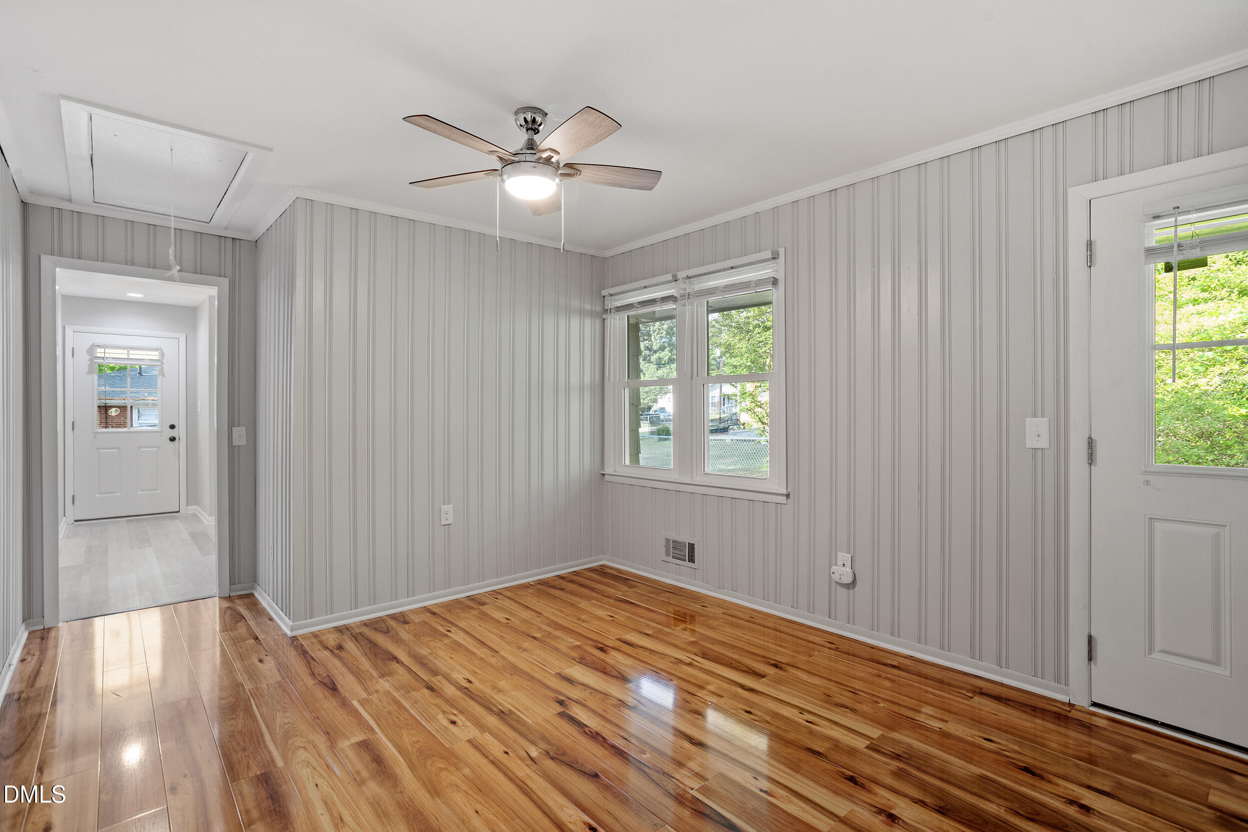 2414 Chapin Street Durham, NC 27707 - Photo 17 of 30 a view of empty room with wooden floor and fan
