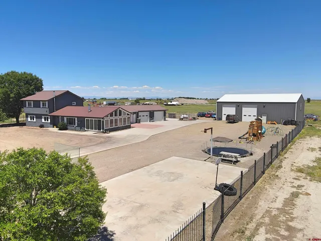 a view of a patio with swimming pool