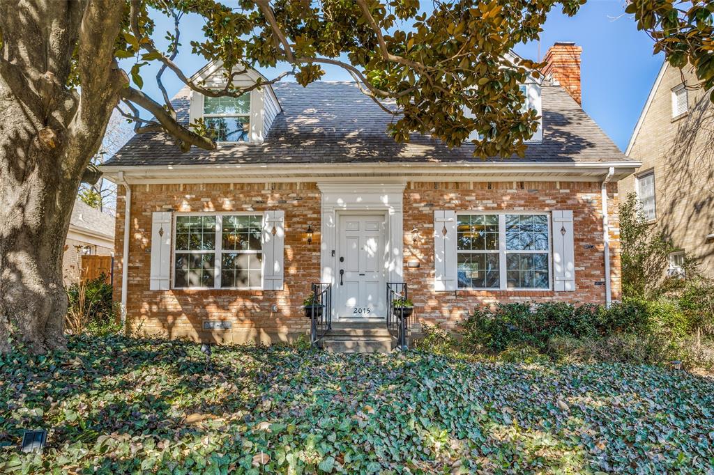 front view of a house with a large window
