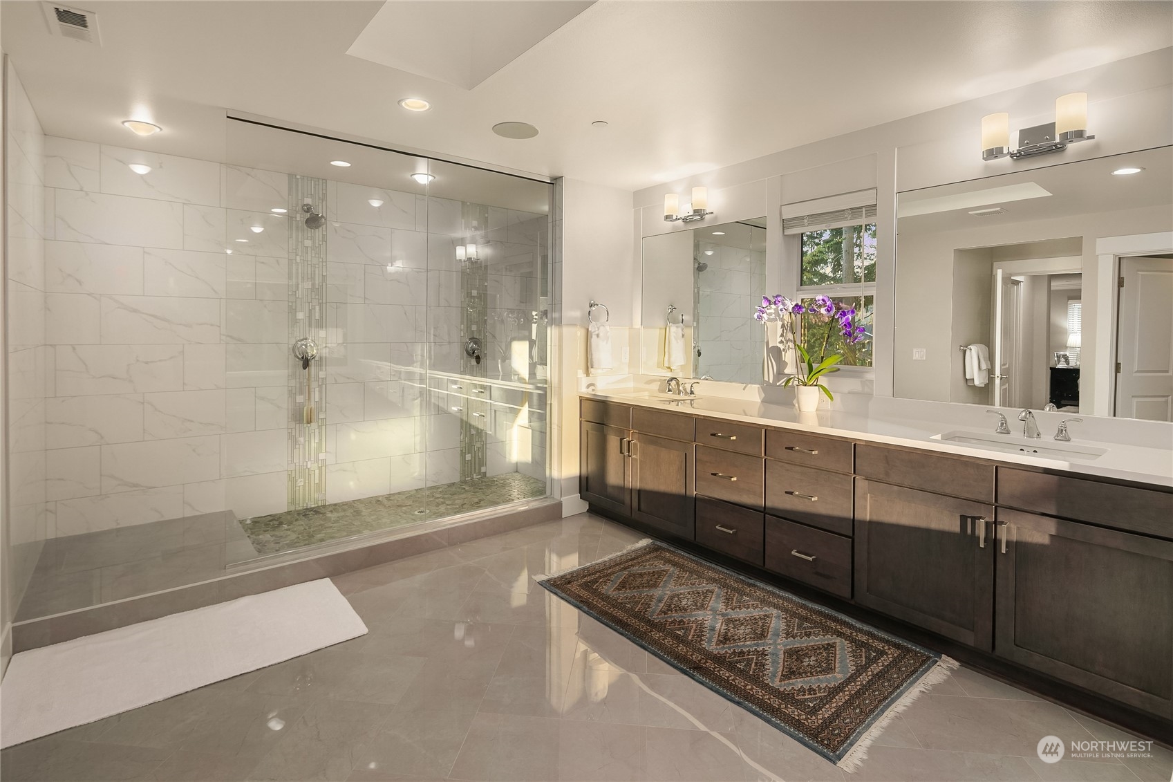 17221 93rd Place Northeast Bothell, WA 98011 - Photo 19 of 32 a bathroom with a double vanity sink mirror and shower