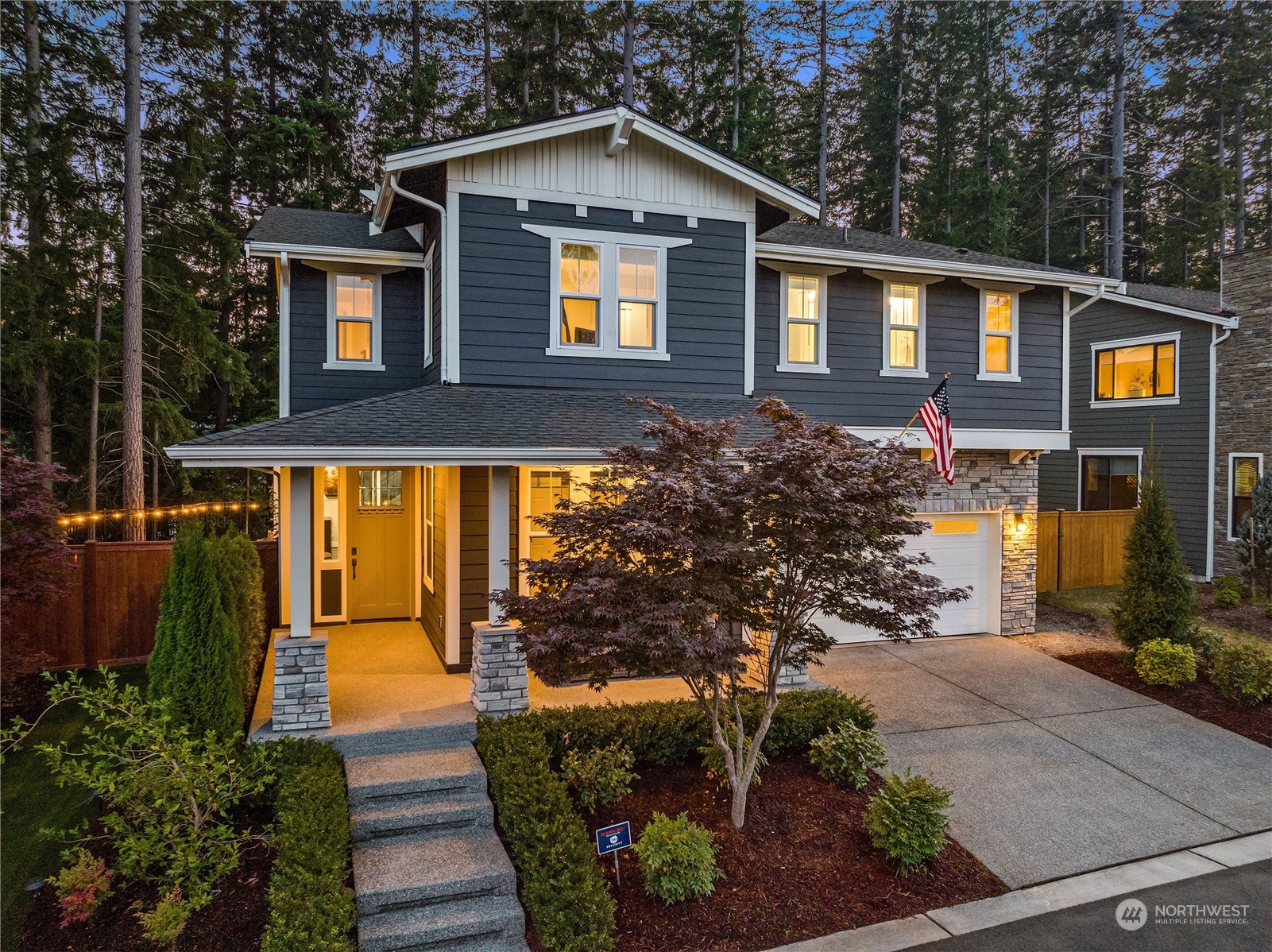 17221 93rd Place Northeast Bothell, WA 98011 - Photo 2 of 32 a front view of a house with a yard