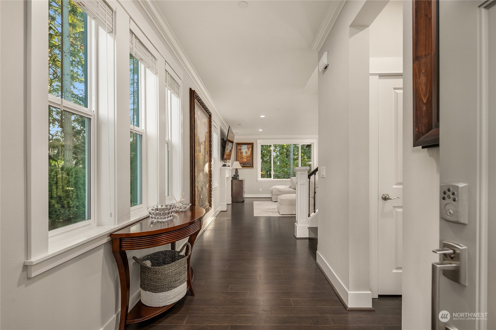 17221 93rd Place Northeast Bothell, WA 98011 - Photo 3 of 32 a view of a hallway with wooden floor and furniture