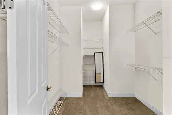 a view of an entryway with hallway