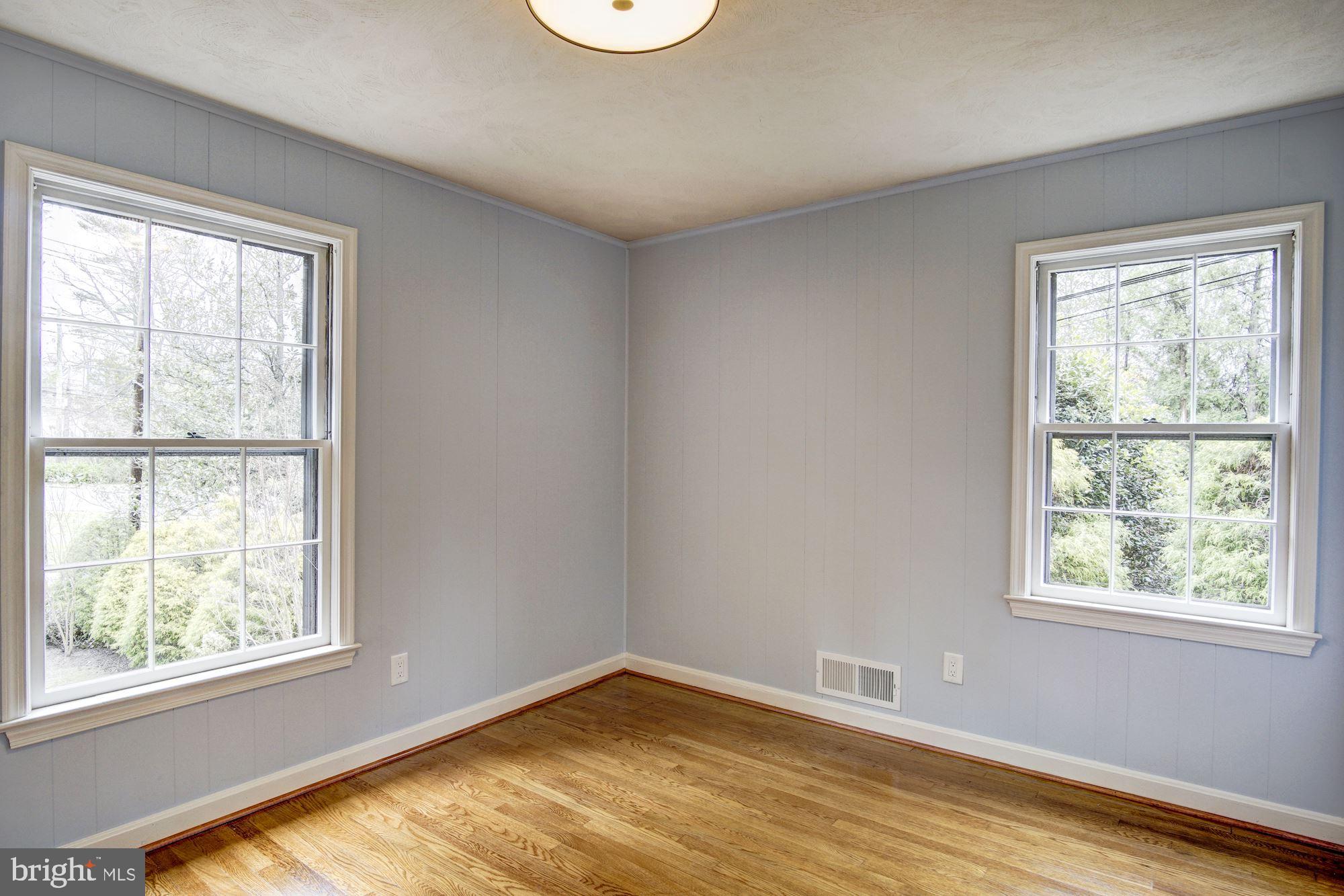 5910 Walhonding Road Bethesda, MD 20816 - Photo 22 of 58 Den, positioned over basement garage