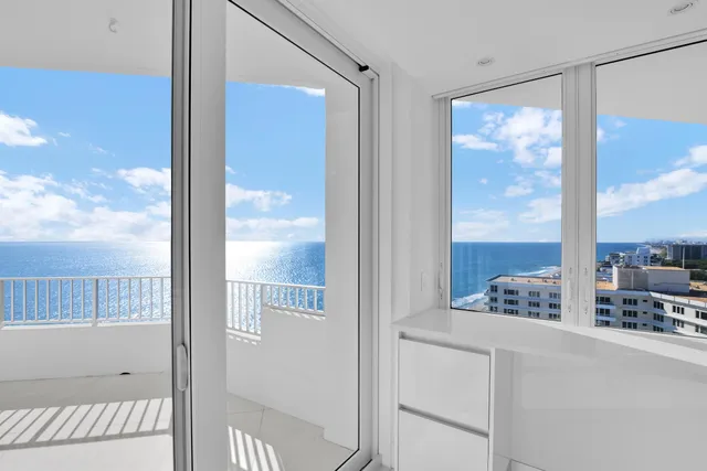 a bathroom with a double vanity sink mirror and