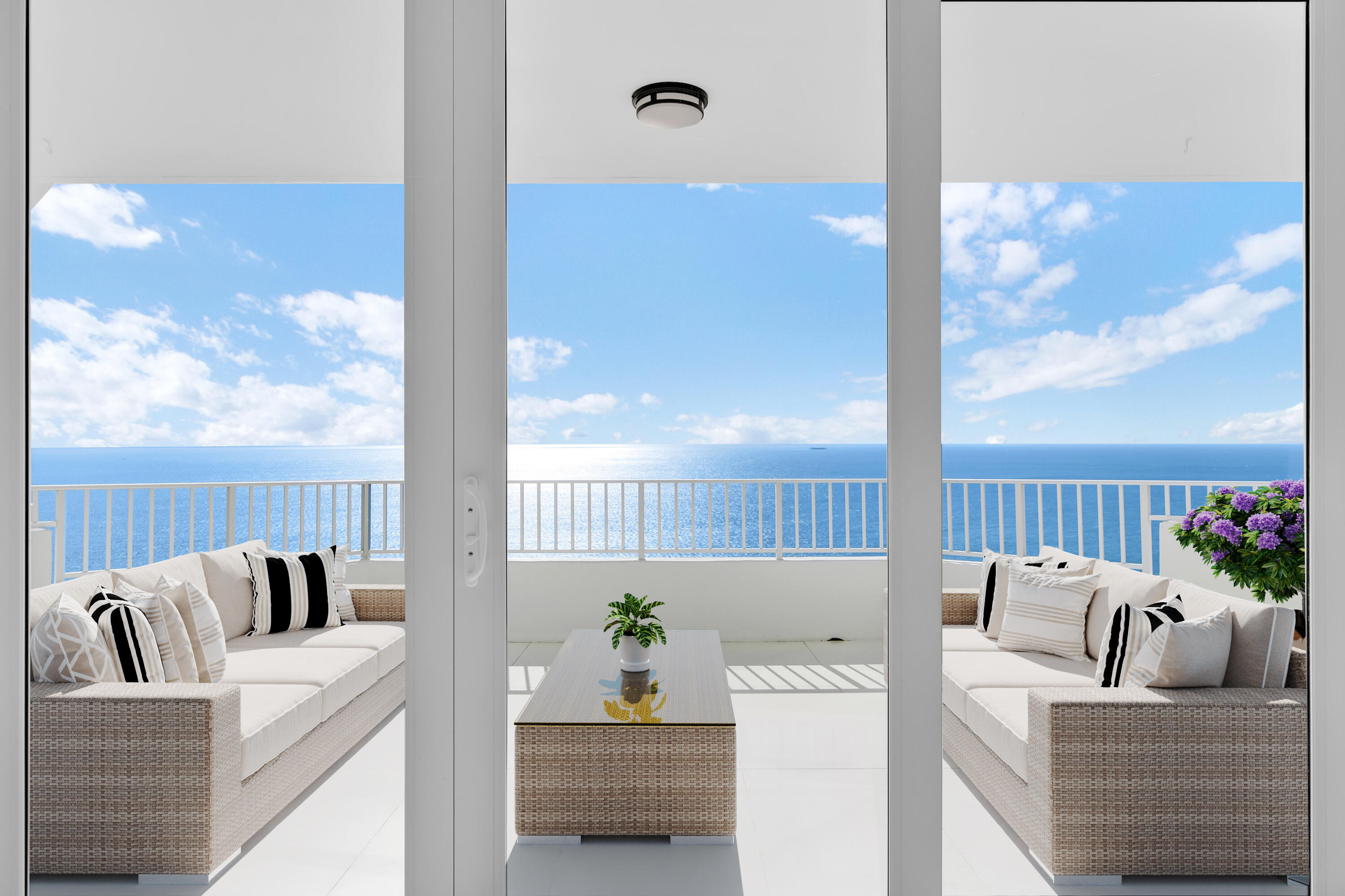 550 South Ocean Boulevard, Unit PH06 Boca Raton, FL 33432 - Photo 2 of 62 a living room with furniture and a large window