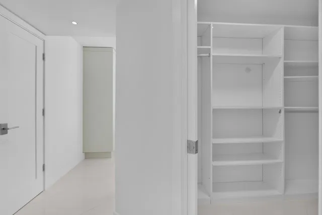 a very nice looking living room with furniture and a large window