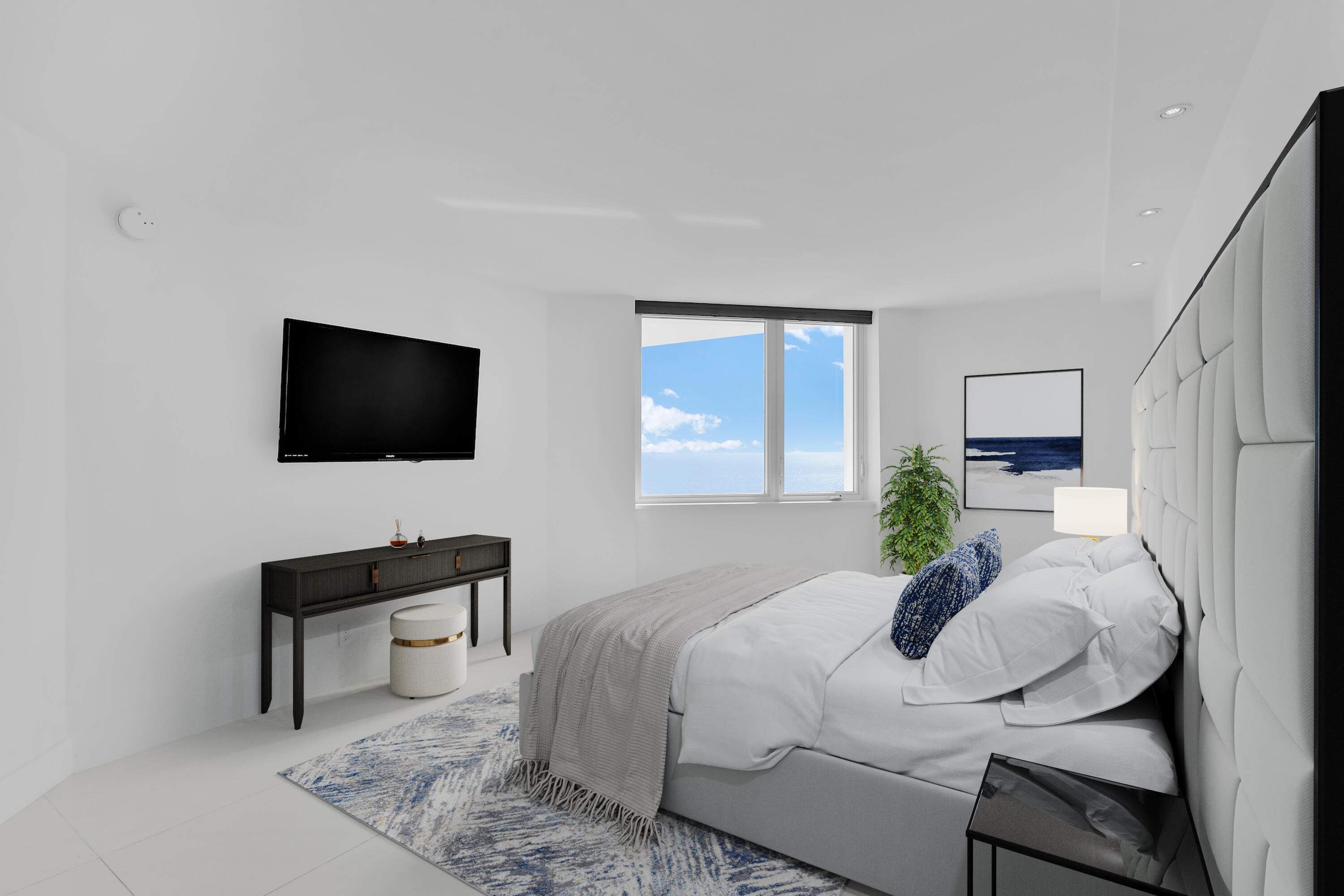 550 South Ocean Boulevard, Unit PH06 Boca Raton, FL 33432 - Photo 6 of 62 a bedroom with a bed and a flat screen tv