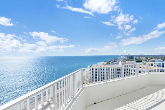 a view of balcony with furniture
