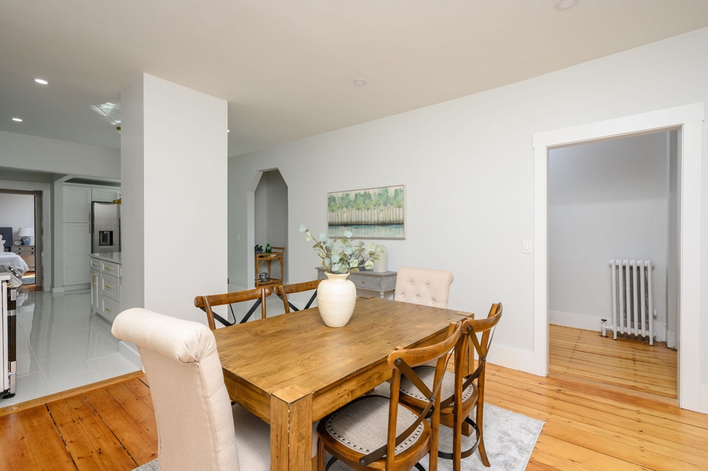 120 Broadway Hanover, MA 02339 - Photo 12 of 35 a view of a dining room with furniture and wooden floor