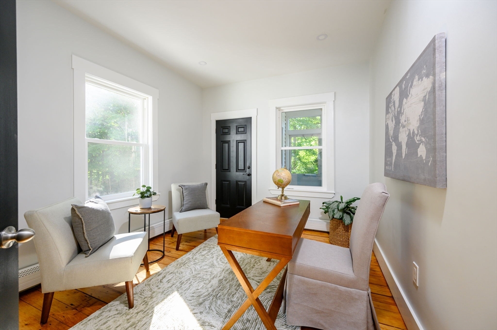 120 Broadway Hanover, MA 02339 - Photo 16 of 35 a living room with furniture and a window