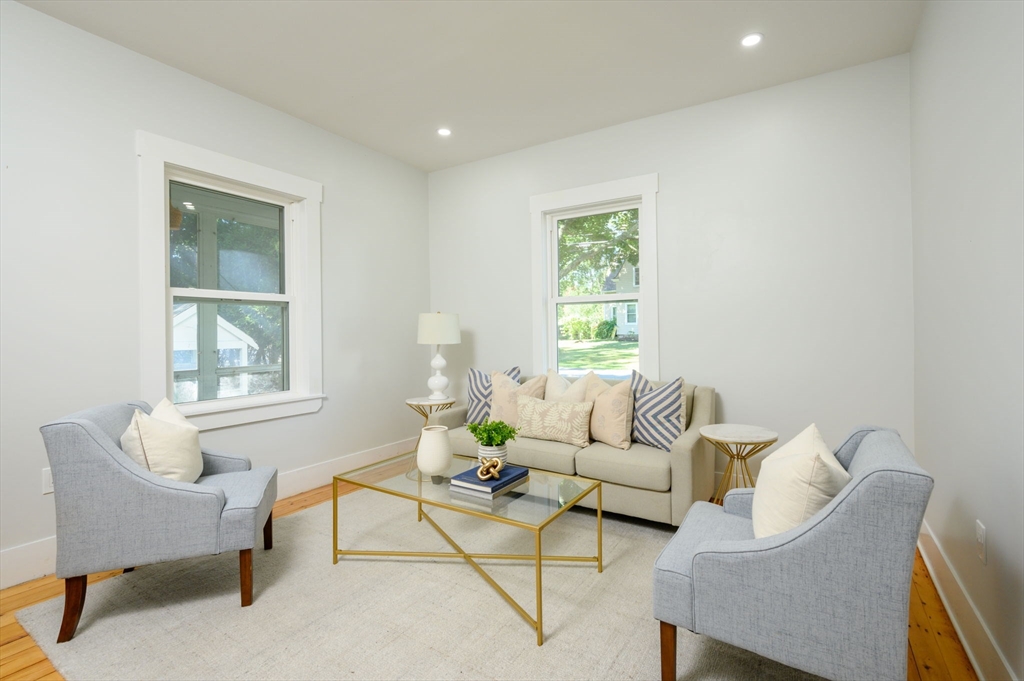 120 Broadway Hanover, MA 02339 - Photo 19 of 35 a living room with furniture and a window