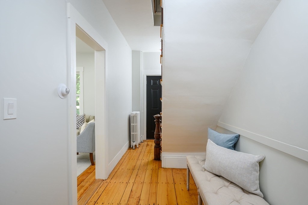 120 Broadway Hanover, MA 02339 - Photo 23 of 35 a bedroom with a bed and a couch