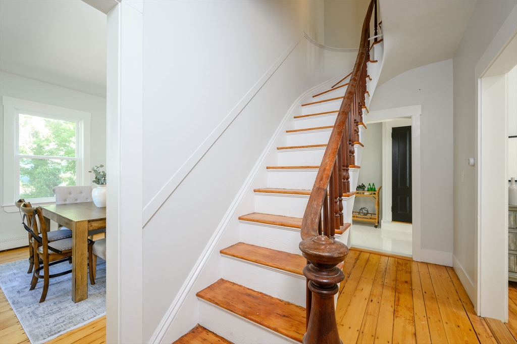 120 Broadway Hanover, MA 02339 - Photo 24 of 35 a view of entryway with wooden floor and stairs