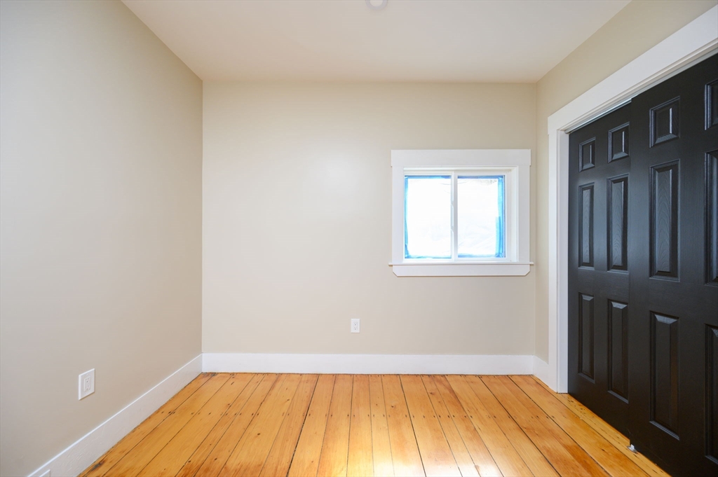 120 Broadway Hanover, MA 02339 - Photo 27 of 35 a view of a room with wooden floor and a window