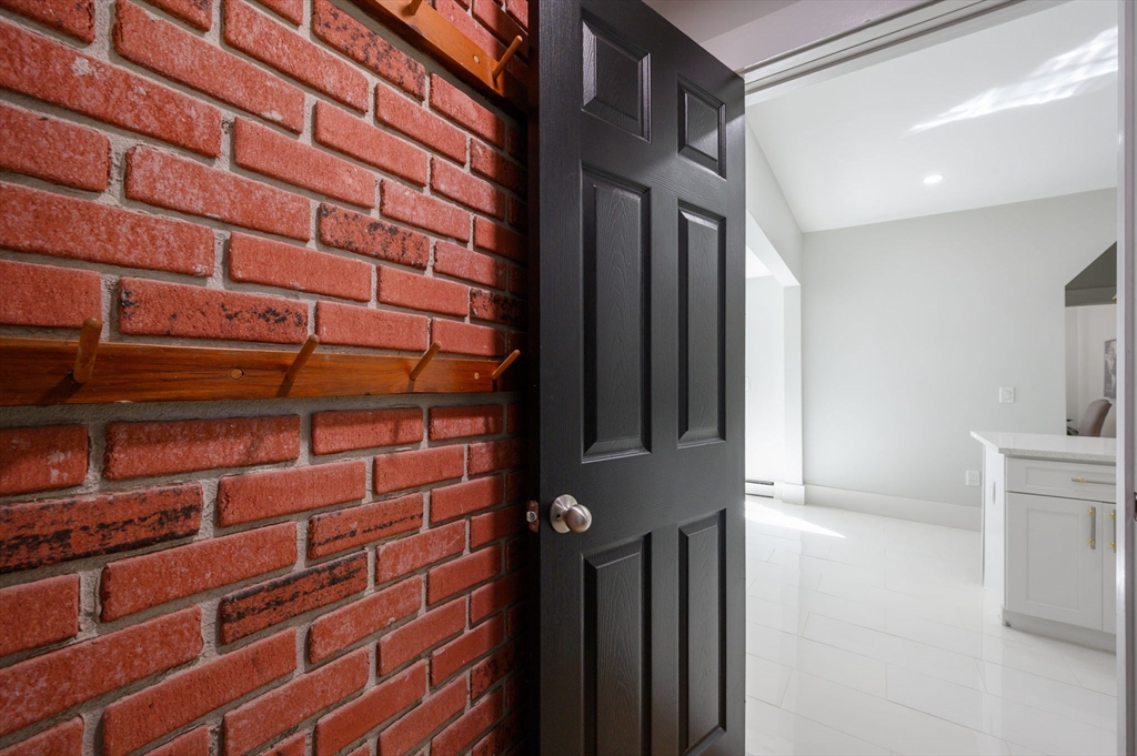 120 Broadway Hanover, MA 02339 - Photo 35 of 35 a view of a brick wall next to a window