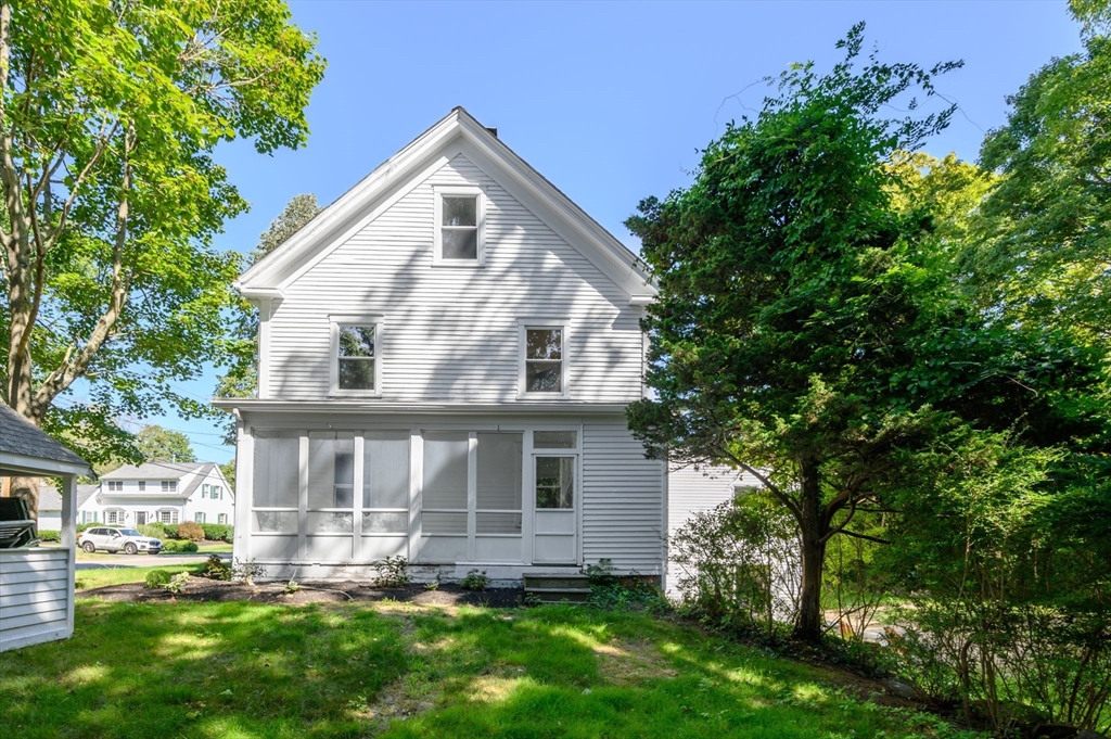 120 Broadway Hanover, MA 02339 - Photo 4 of 35 a front view of a house with a yard