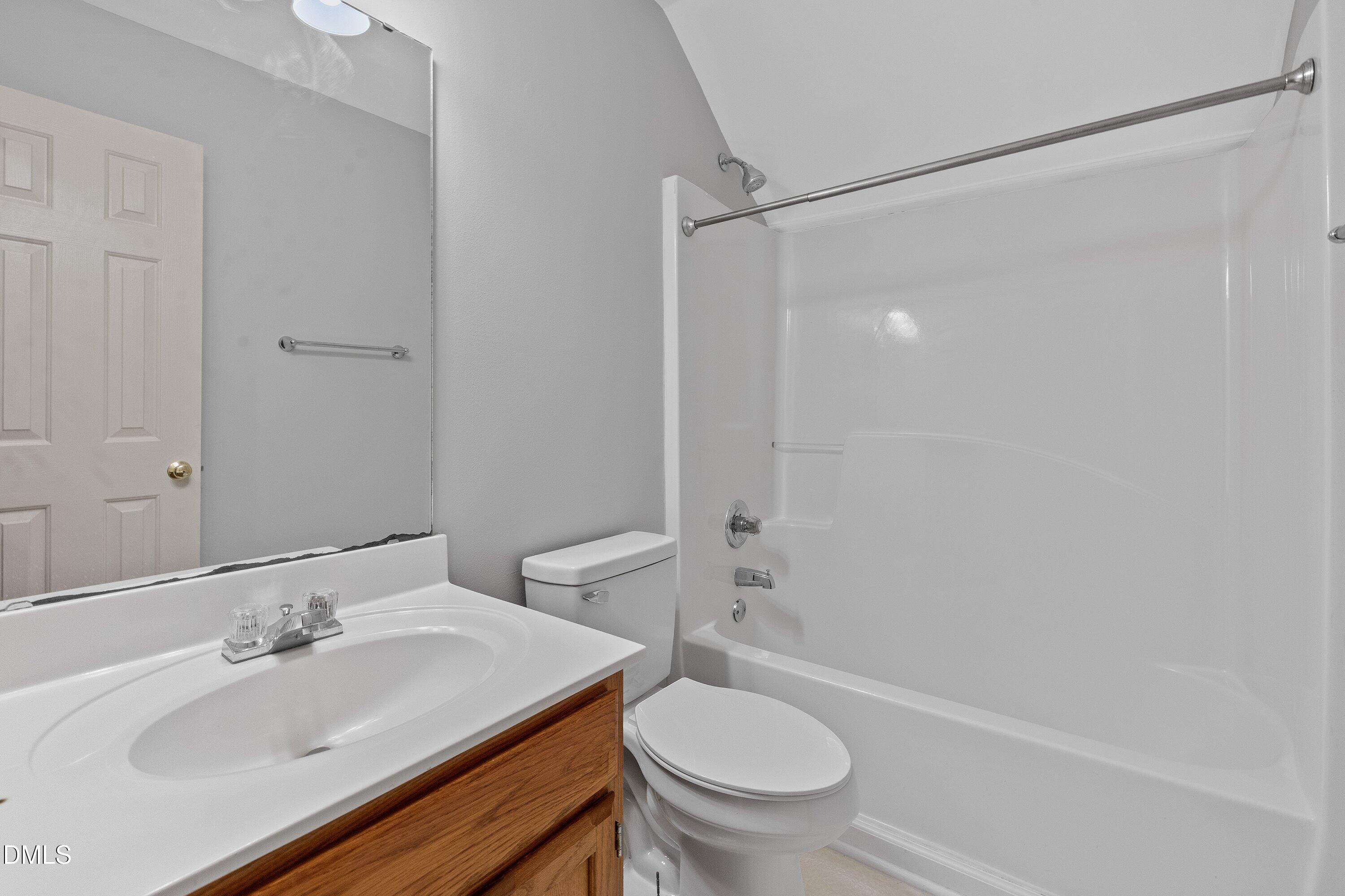 113 Laurel Branch Drive Cary, NC 27513 - Photo 34 of 40 a bathroom with a sink toilet and shower