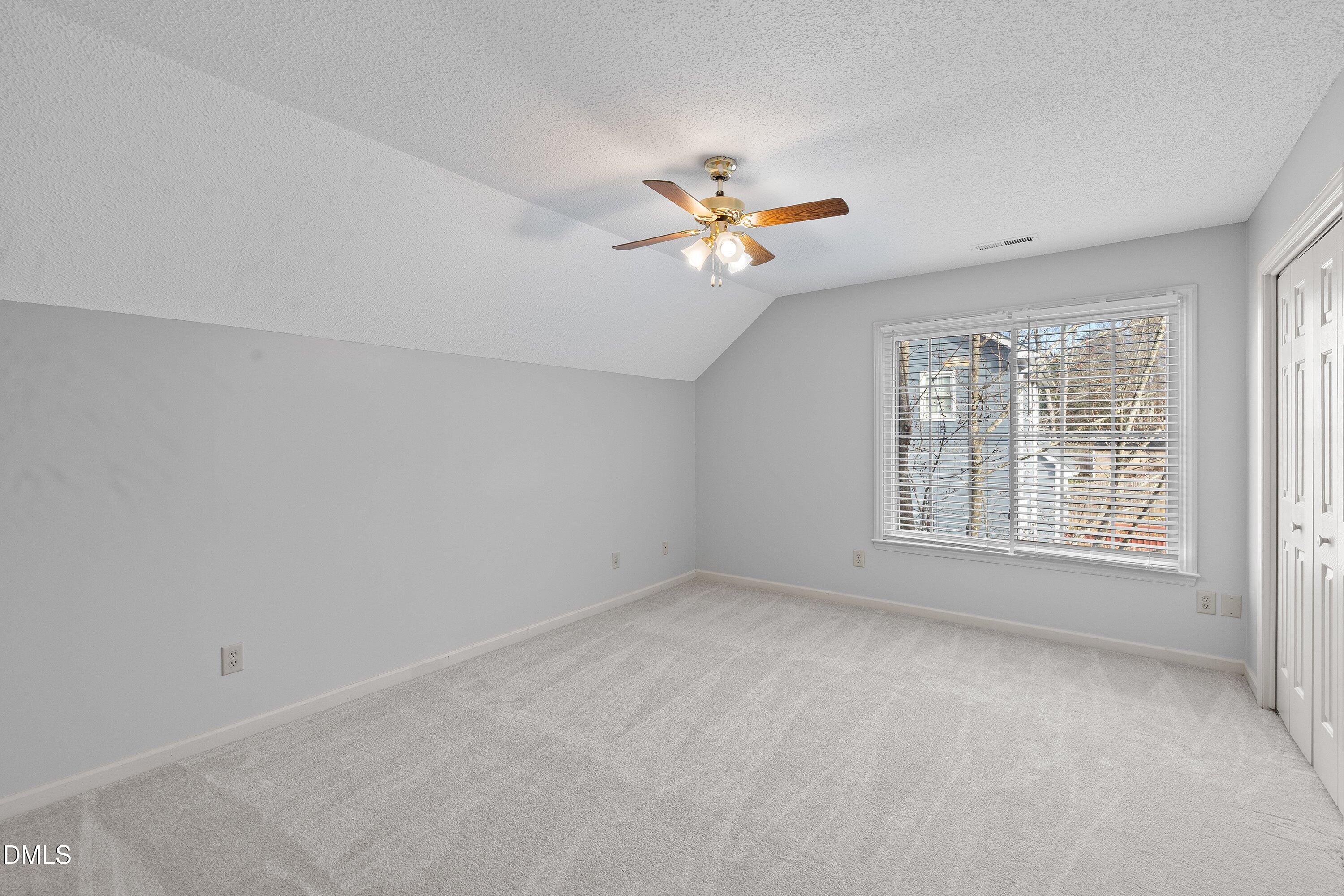 113 Laurel Branch Drive Cary, NC 27513 - Photo 35 of 40 a view of an empty room with a window