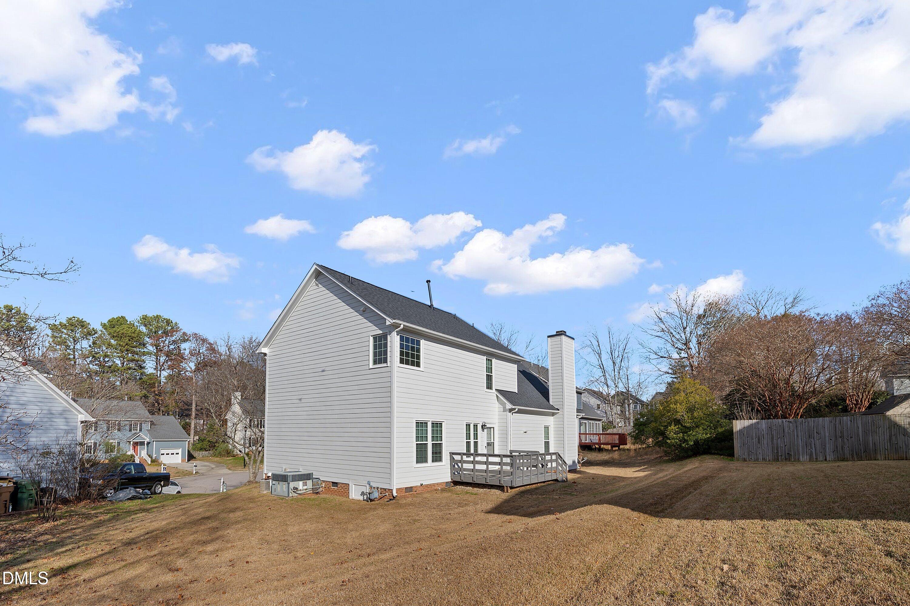 113 Laurel Branch Drive Cary, NC 27513 - Photo 38 of 40 a view of a house with a yard