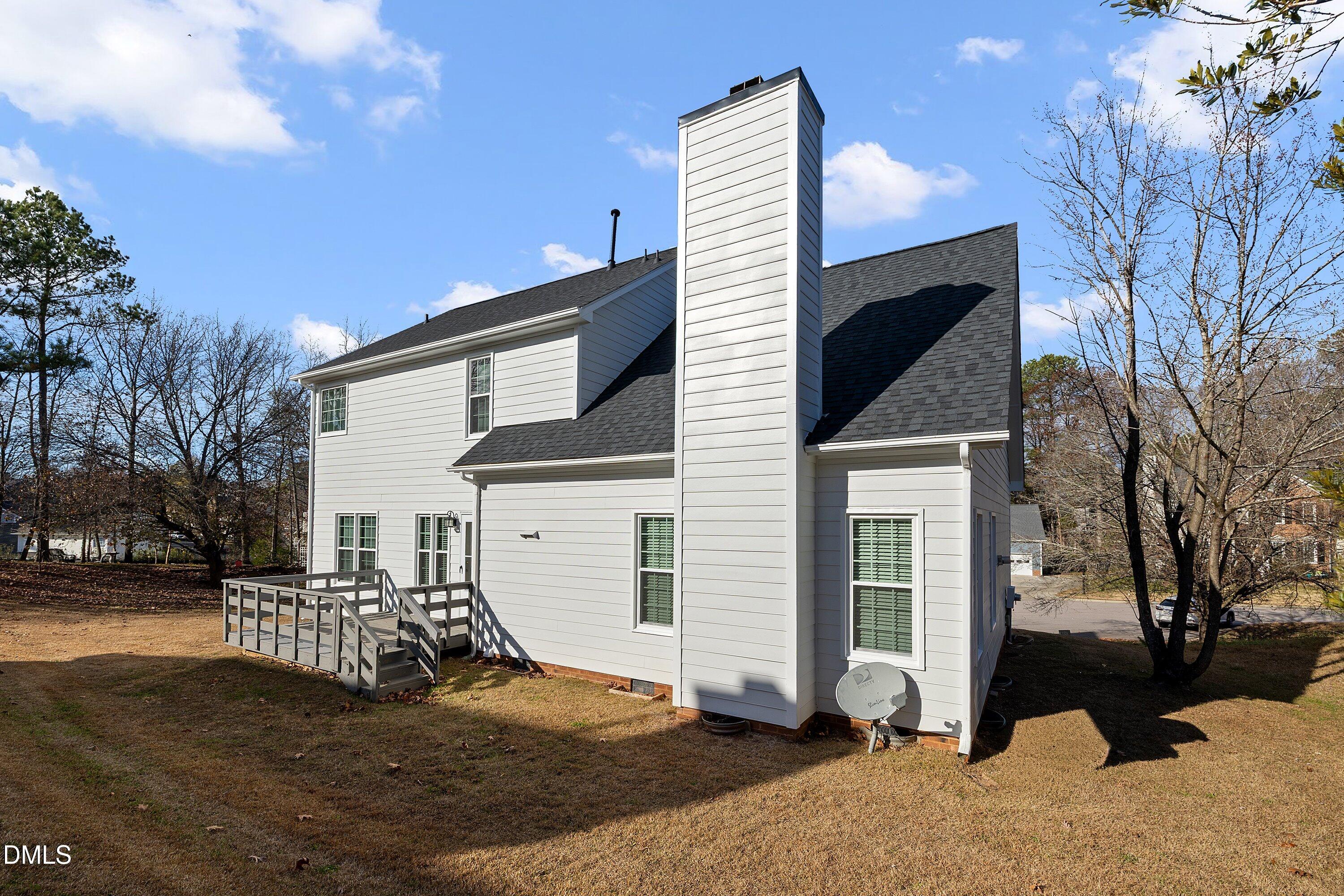 113 Laurel Branch Drive Cary, NC 27513 - Photo 39 of 40 a view of a house with a yard