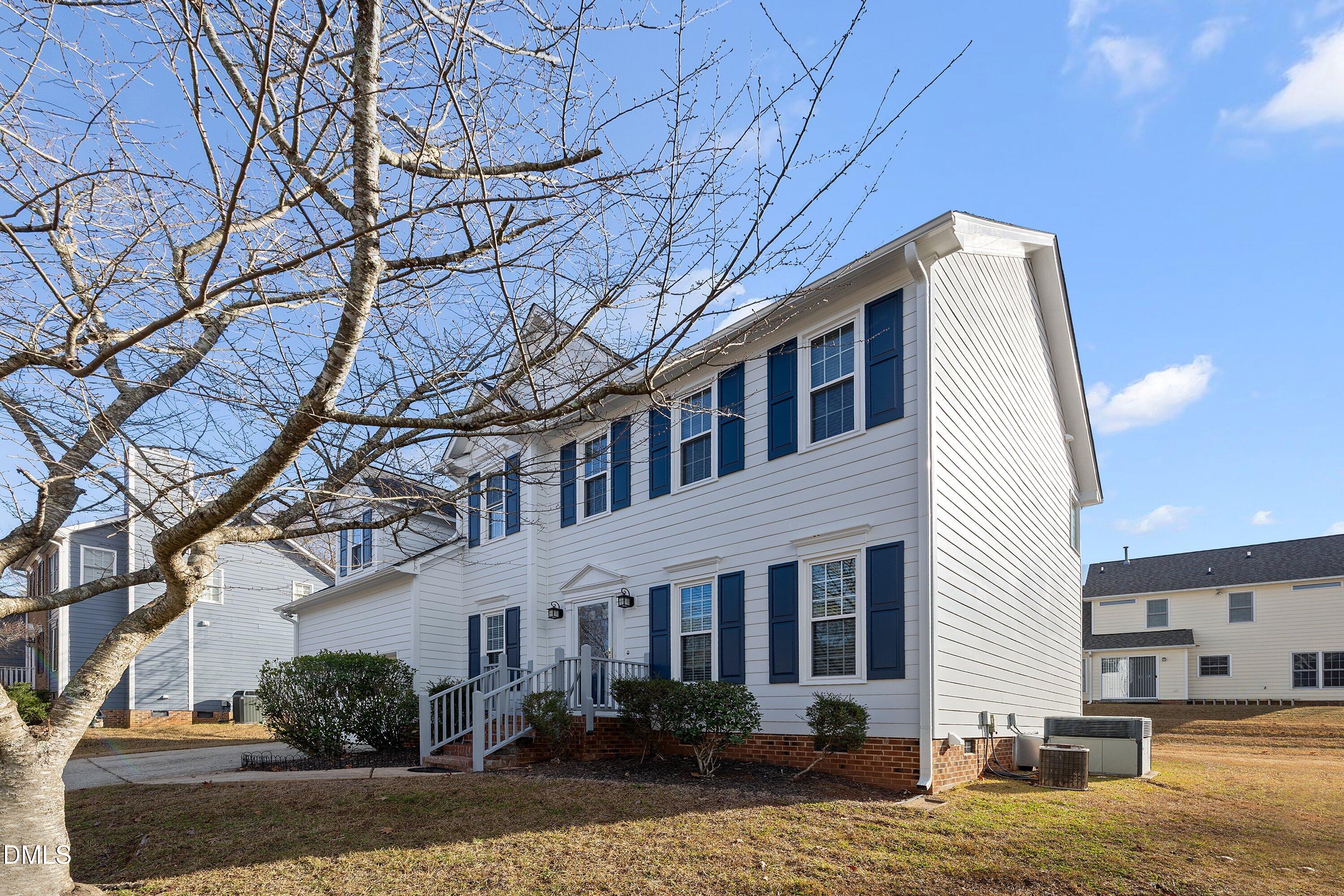 113 Laurel Branch Drive Cary, NC 27513 - Photo 4 of 40 a front view of a house with garden