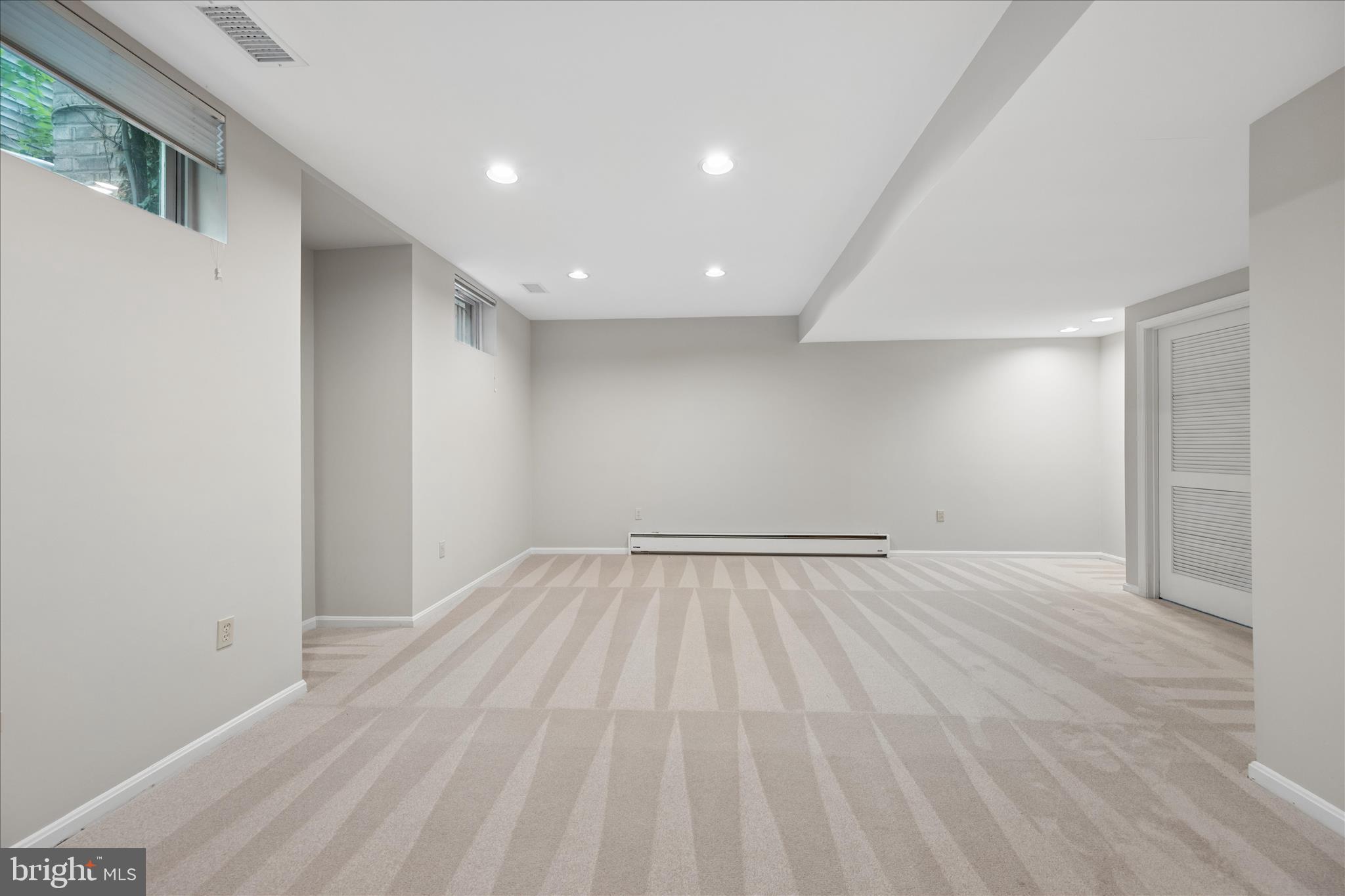 8900 Ellsworth Court Silver Spring, MD 20910 - Photo 60 of 86 Lower-Level vast recreation room