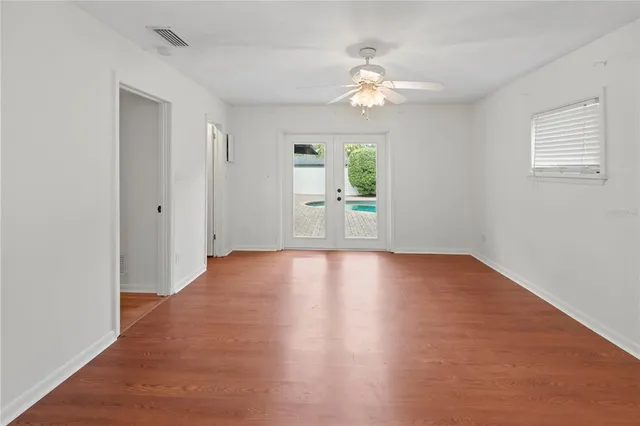 a front view of a house with a yard and porch
