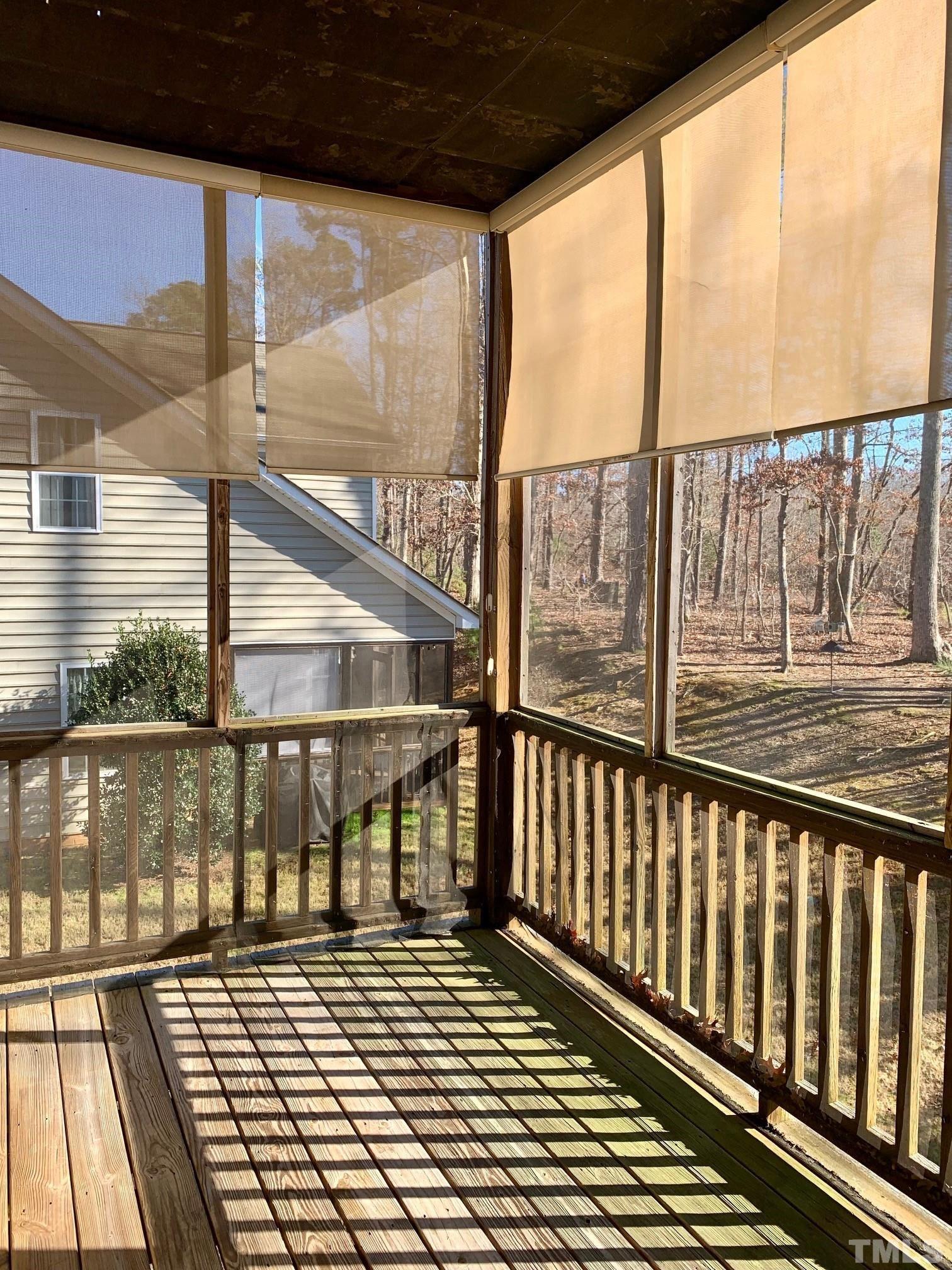 241 Grenoch Valley Lane Apex, NC 27539 - Photo 16 of 27 a view of a balcony with wooden floor