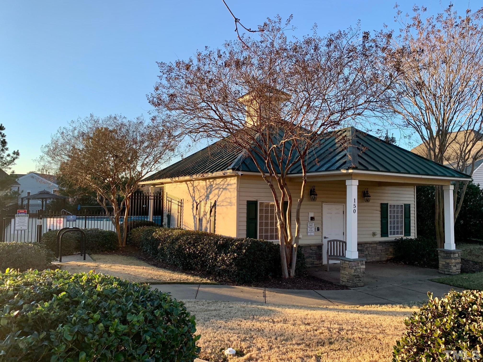 241 Grenoch Valley Lane Apex, NC 27539 - Photo 26 of 27 a front view of a house with garden