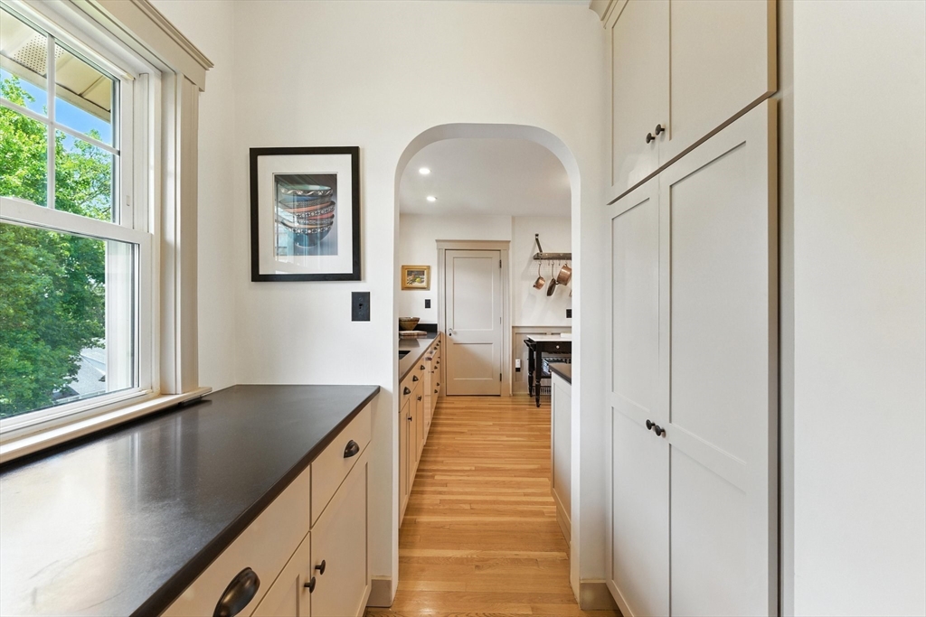 29 Hillcrest Circle, Unit 2 Watertown, MA 02472 - Photo 11 of 36 a view of a living room with a large window