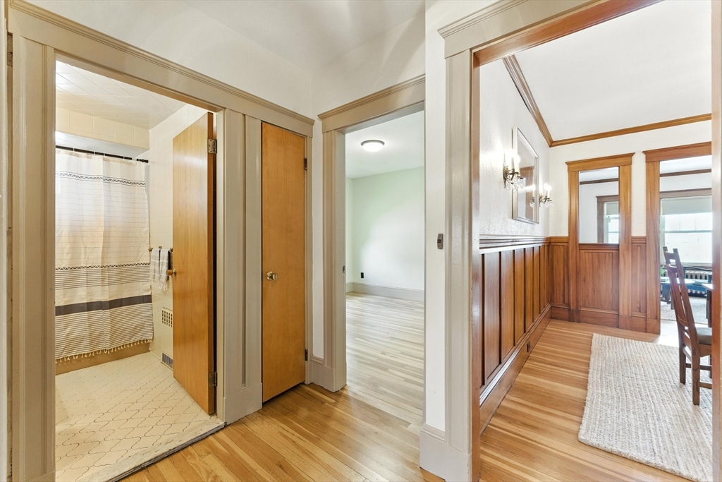 29 Hillcrest Circle, Unit 2 Watertown, MA 02472 - Photo 16 of 36 a view of a bathroom with a glass door
