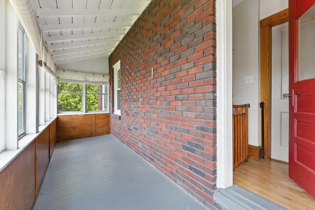 29 Hillcrest Circle, Unit 2 Watertown, MA 02472 - Photo 21 of 36 a view of balcony with couch